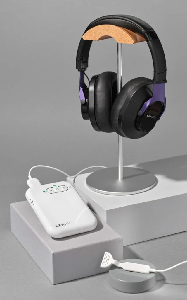 The Lenire bimodal tinnitus system. Wireless headphones, a handheld controller, and the Tonguetip mouthpiece
